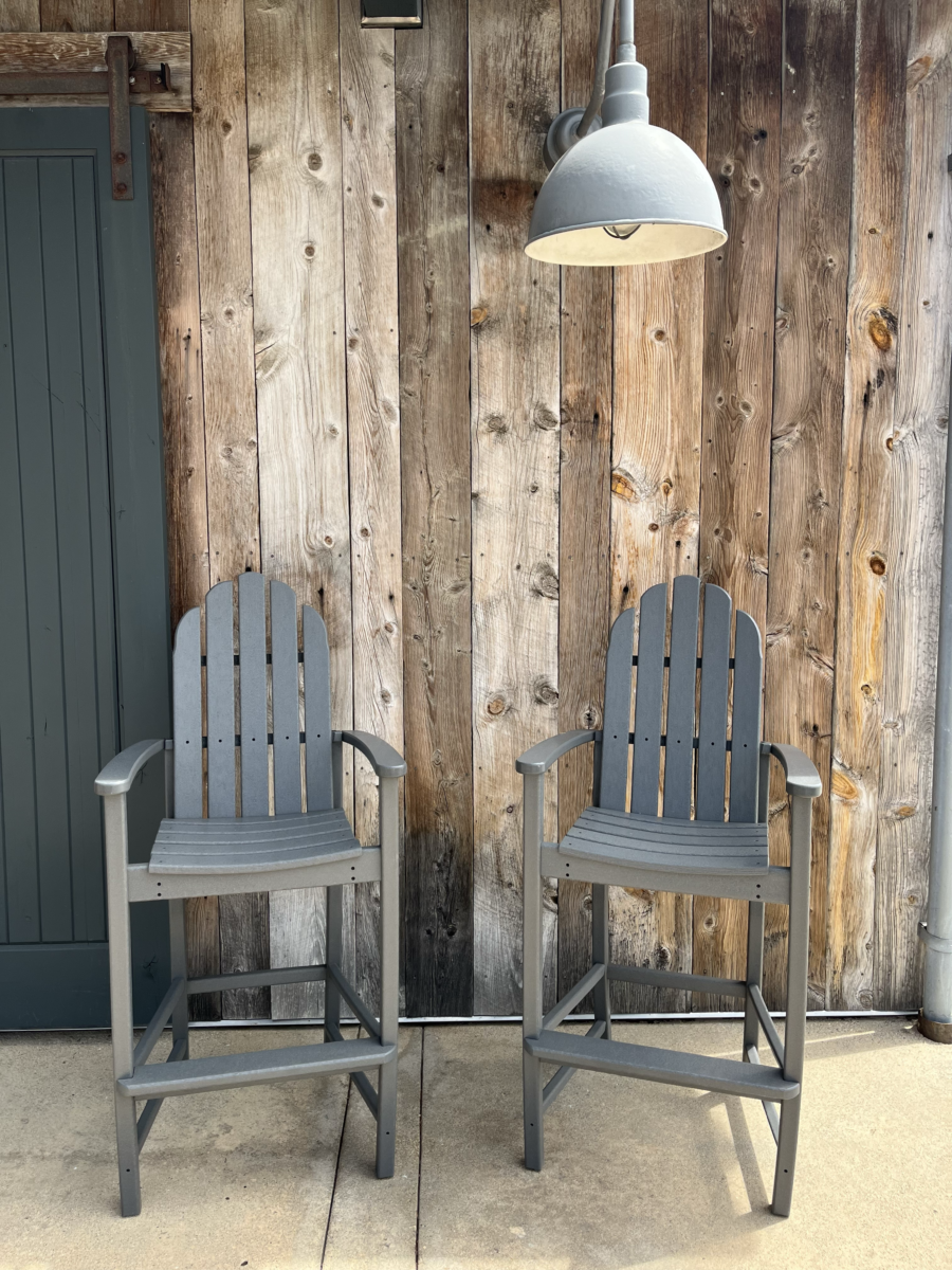 Trancas Market, image of 2 chairs with a light hanging above. 