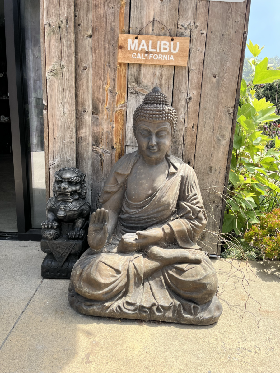 Buddha statue with "Malibu California" sign at Trancas Country Market